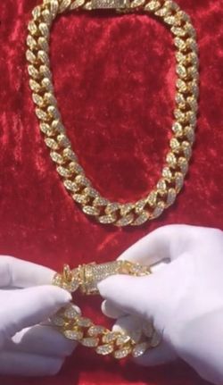 New 18 k yellow gold Cuban link chain and bracelet