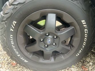 Almost NEW 245 65 17 tires trade me yours plus cash BF GOODRICH KO2 A/T