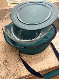 2pyrex containers with lids.