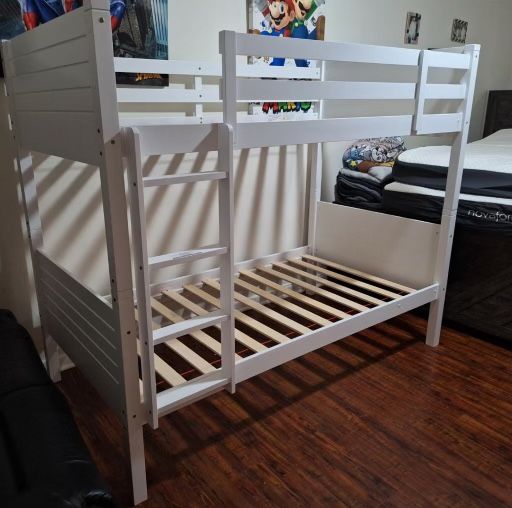 Twin bunk bed. Available in espresso and white. Assembly...