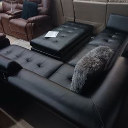 *Manager's Special*---Ibiza Black Sophisticated Leather Sectional Sofa W/Ottoman---Delivery And Easy Financing Available 👏