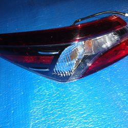 2018 To 2021 Toyota Camry Driver Side Quarter Panel Tail Light With A Black Inner Bezel OEM Part