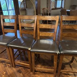 4 wood barstools. Counter height