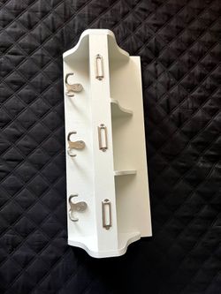 Shelf with hooks