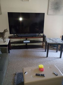 Entertainment center with coffee table and two side tables