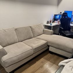 beige L-shaped couch