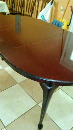 Brown table with 6 chairs