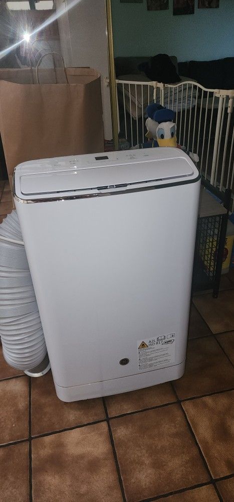 Basically Brand NEW - Used 1x-GE 10,000 BTU Portable Air Conditioner/Dehumidifier & Remote