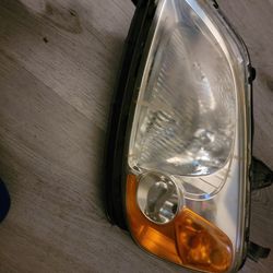 Civic sudan 2002 driver side front headlight