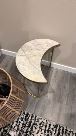 Crescent moon marble table