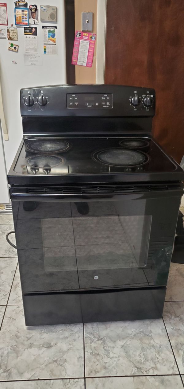 GE glass top 4 burner stove but one burner doesn't work for Sale in
