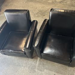 Set Of Black Chairs 32” Tall  30” X 28” Wide In good condition, no tears or rips.  