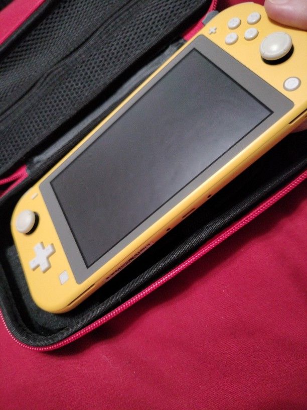 Nintendo Switch Lite Yellow Model HDH-001 32 Gig Standard Memory With Grey Screen Trim