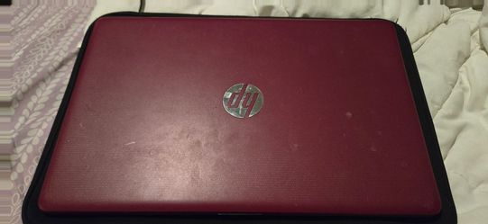 HP Pavilion 15 Windows laptop in maroon