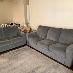 Ashley furniture ; grey Couch and loveseat
