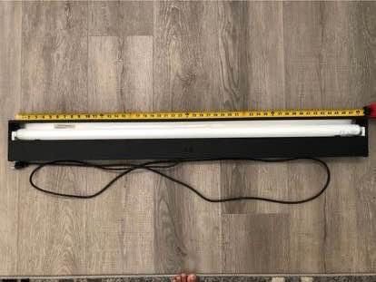 Fluorescent Light Fixture with a Light Bulb - 4 Feet