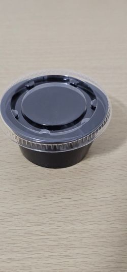 Black Plastic Portion Cup with Clear Lid. 5 packs of cups and 18 packs of lids.