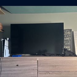 TV AND PS5 And 2 GAMES AND 2 REMOTES 