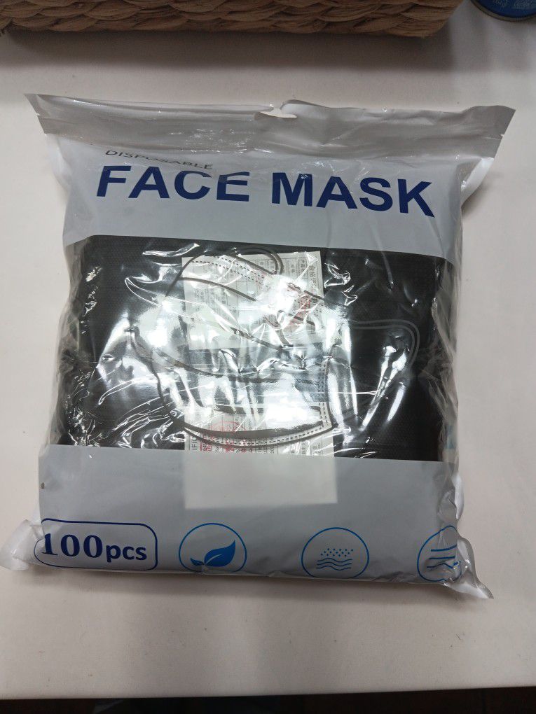 100 pcs.  disposable black face masks
