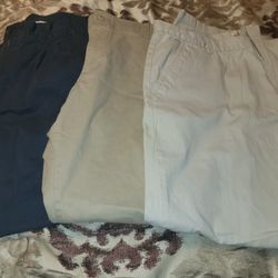 💥USED 3 PAIR OF MENS PANTS. SIZE 40-30. 2 KAKI COLORED ONE ARE LIKE NEW.  GRAY WRITTEN MORE BUT NO HOLES,  OR TEARS