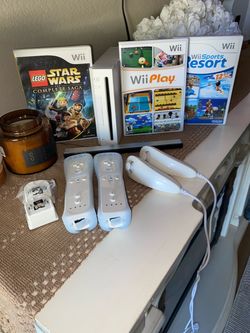 Wii with remotes and games