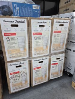 American Standard Reliant 2-Piece 1.28 GPF Single Flush Round Toilet with a slow-close seat included