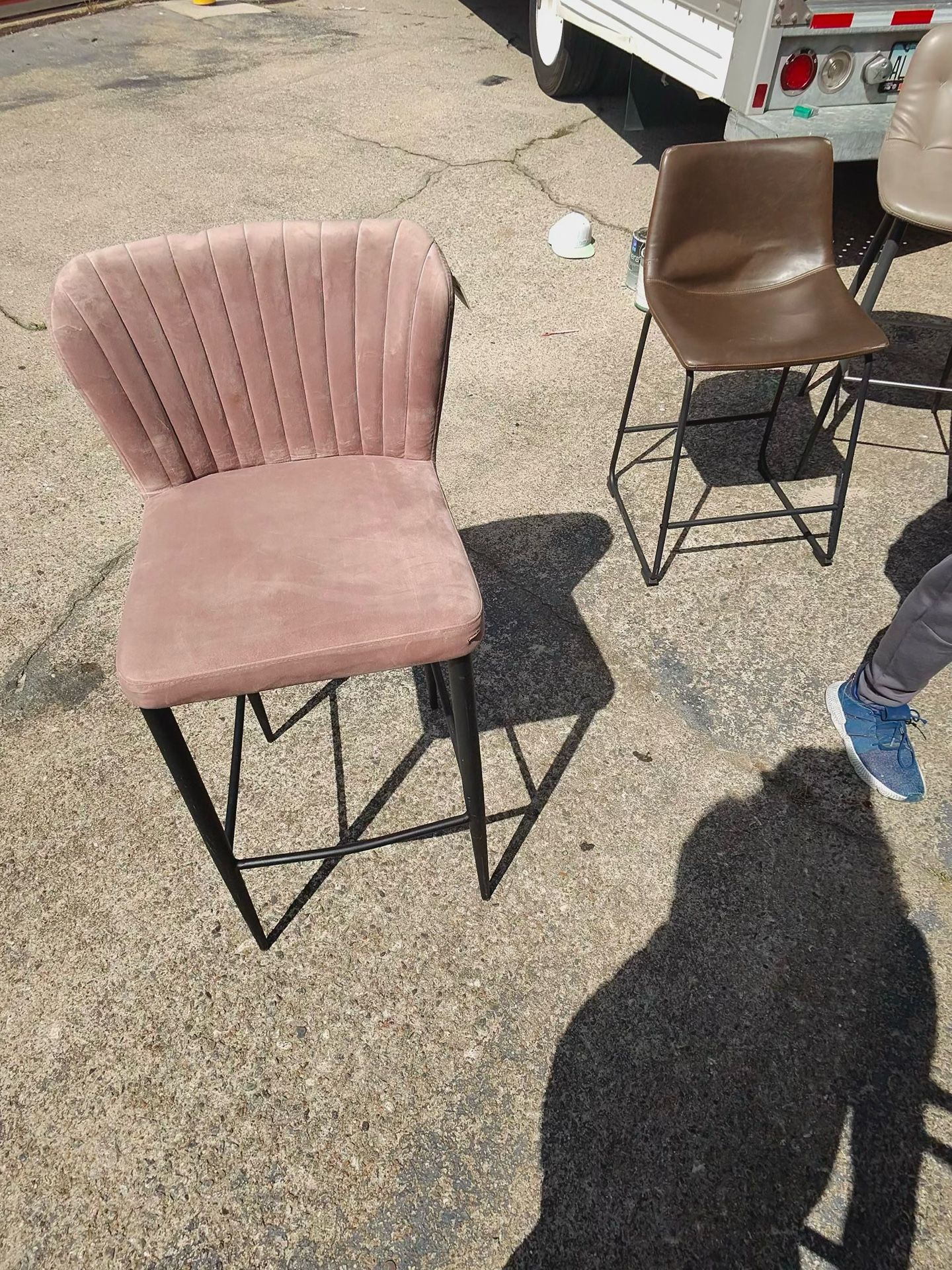 One pink barstool