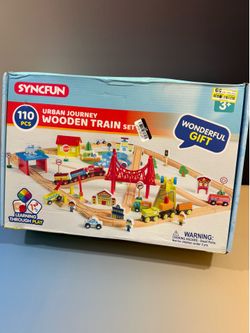 110 piece wooden train set.  brand new