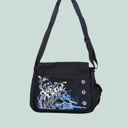 Lifestyle Unisex Canvas Graffiti Bag, Canvas Shoulder Bag with Urban Street Art Design. COMPACT DIMENSIONS: Measures 41cm length x 29cm height x 10.5c