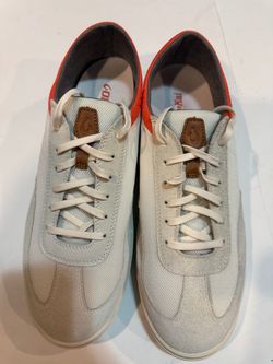 The Olukai Punini Men's Sneakers in Off-White/Molten Orange, size 13
