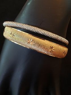 $10. Vintage Monet and Napier bracelets. Gold tone is Monet diamond cut. Silvertone is Napier. Fits up to 8.5 inch wrist.