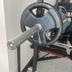 SQUAT RACK — 45lbs Weights X2–Barbell 45lb—-folded Bench