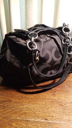 Coach used purse in goog condition .