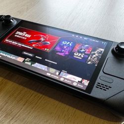 Steam Deck Oled 1 Terabyte With Screen Protecter On It N Comes With Fan 