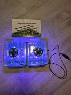 Seedling starter trays with grow lights
