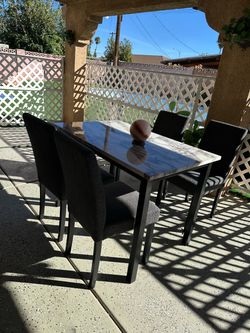 Marble dining table set.