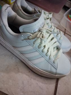 Ladies baby blue white Adidas size 6
