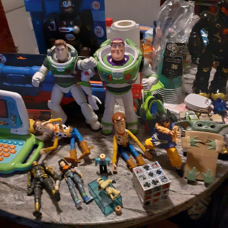 Old And New Toys Som Are Collectible Dragonballz Woody Buzz Light Year Walking Robots Leap Frog  Games For Kids