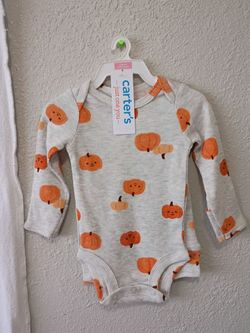 BRAND NEW NEWBORN ONESIES