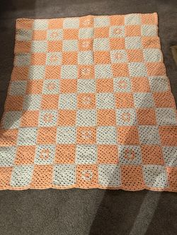 Peach & white hand crocheted afghan