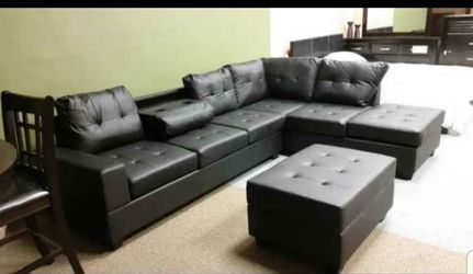 New Black Sectional with Storage Ottoman
