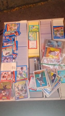 Baseball and football cards ( maybe 500) 90 , 91 ,92 and more $100