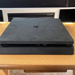 Play Station 4 Slim With Controller. In Good Condition 
