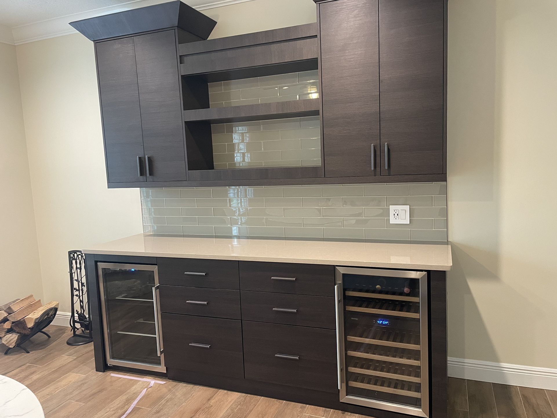 High End Bar With Two Mini Fridges And Under Counter Lighting.