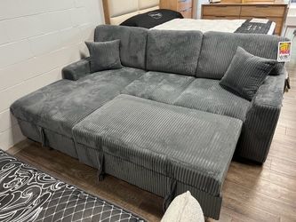 Sectional with pop up bed and storage! NEW SALE