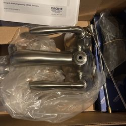 Four Grohe Stainless Centerset Faucets