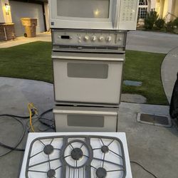 Double Oven, Gas Stovetop, and Top Microwave 