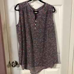 Women’s Size 2X (18 / 20) SleevelessTop.  Made of 65% Rayon and 35% Polyester.  Brand Faded Glory.  Preowned good condition.  