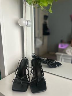 Black strapped heels