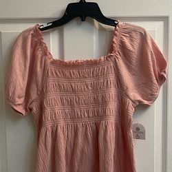Brand new Girls peach knit top size XL